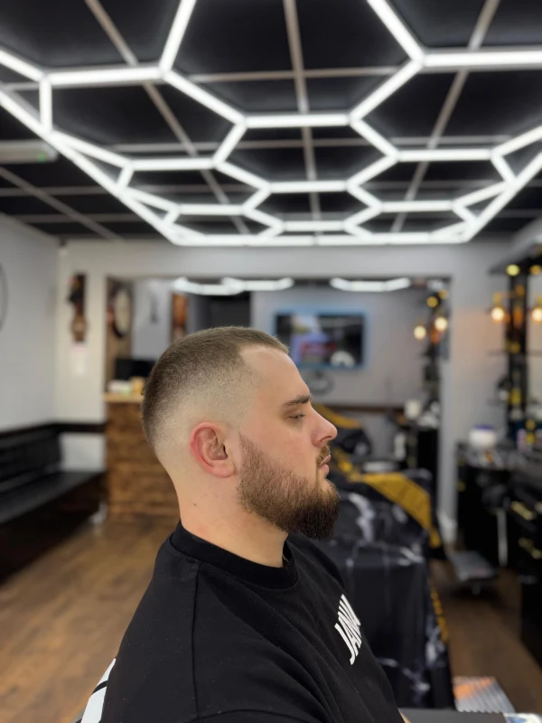 Side view of a guy who just a had a fresh haircut